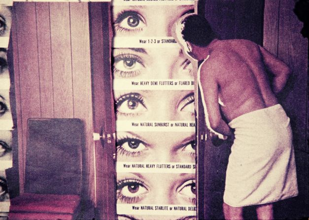 Film still from "Couples" by Maria Lassnig. It shows a room with organized posters on the walls. Eyes are portrayed on the posters. A man with a towel around his waist looks at them. 