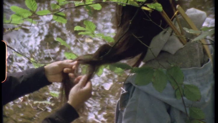 Filmstill aus REROOTING vom Post (Film) Collective