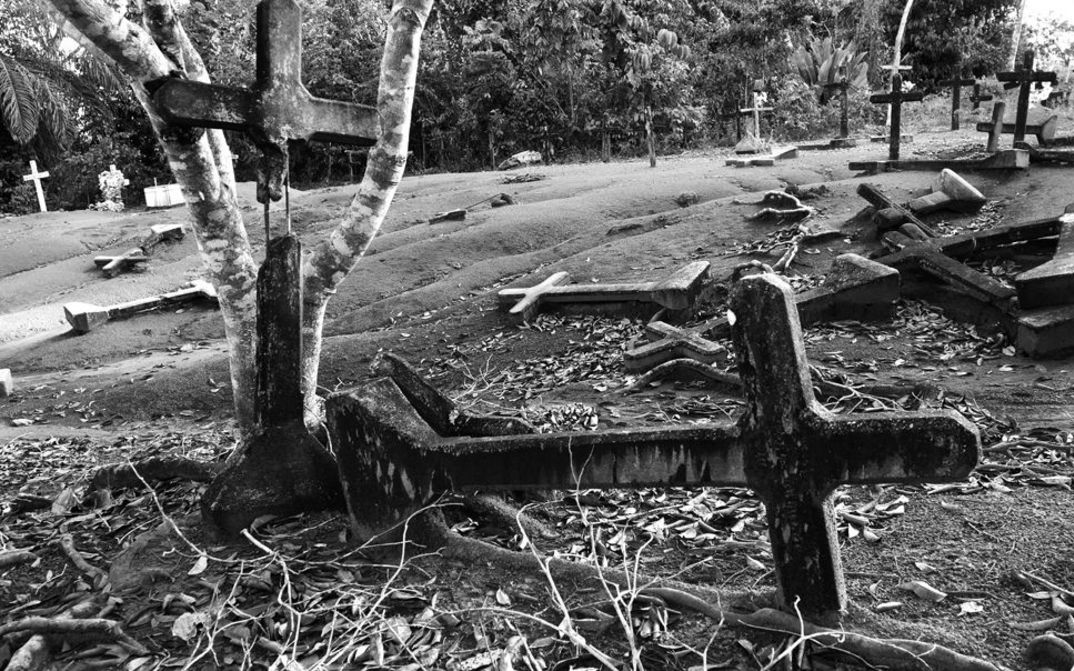 Film still from FORDLANDIA: Fallen crosses in a deserted cemetery.