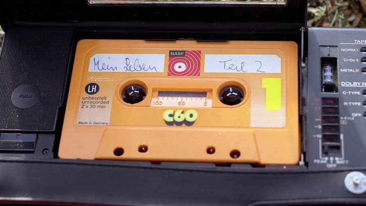 Film still from MEIN LEBEN TEIL 2: An audio cassette labeled "My life part 2".
