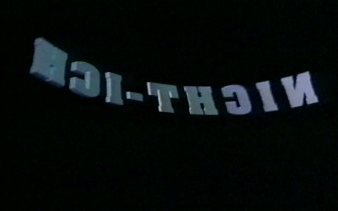 Filmstill from an A-CLIP: A black picture with the words "Not-me" in silver.