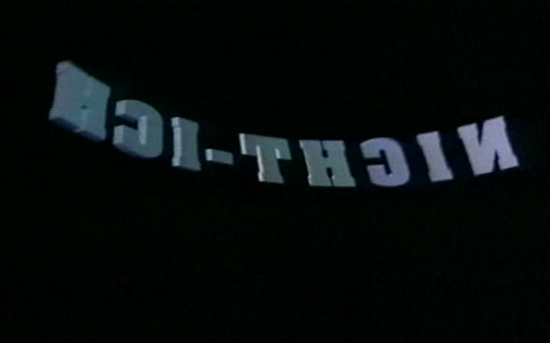 Filmstill from an A-CLIP: A black picture with the words "Not-me" in silver.