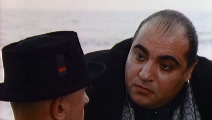 Film still from SECOND-CLASS CITIZEN: Two men in conversation.