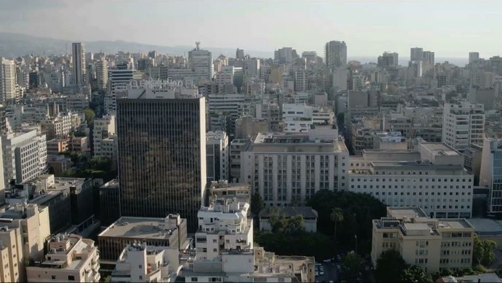 Film still from AFTER THE END OF THE WORLD: An aerial view of Beirut.