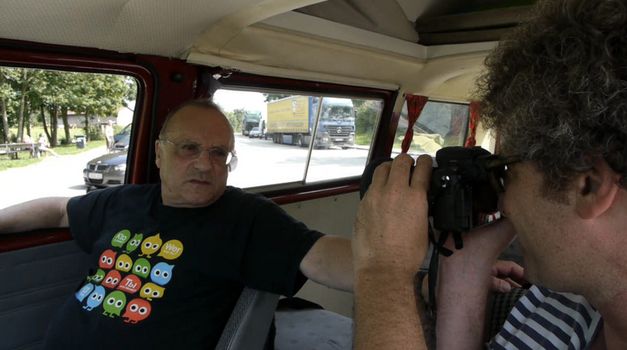 Film still from FATHER AND SON. The filmmaker with his father in a car.