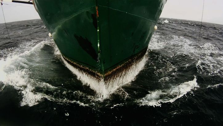 Film still from LEVIATHAN: Close-up of the bow of a ship.