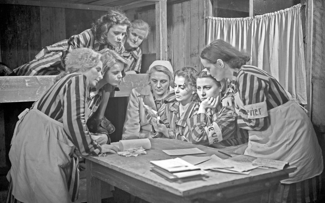 Film still from THE LAST STAGE: A group of female prisoners in the barracks of a concentration camp.