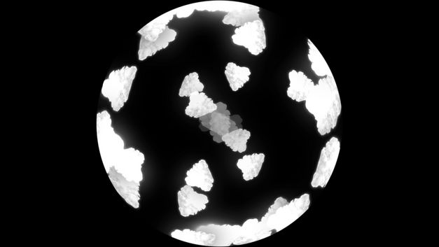 Still from the film "White Sands Crystal Foxes" by Liz Rosenfeld. A sphere in front of a black background reminiscent of a globe.