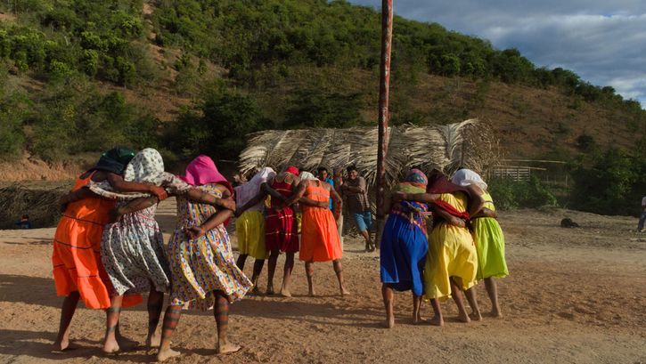 Film still from YÃMIYHEX: AS MULHERES-ESPÍRITO: A group of women performing a ritual.