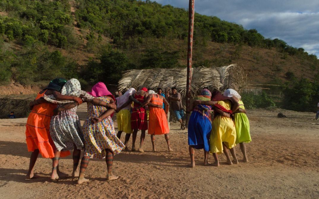 Film still from YÃMIYHEX: AS MULHERES-ESPÍRITO: A group of women performing a ritual.