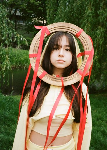 Portrait of teenager with garland on her head