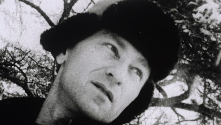 Film still from LOST LOST LOST. You can see Jonas Mekas in a fur hat, looking pensively into the distance.