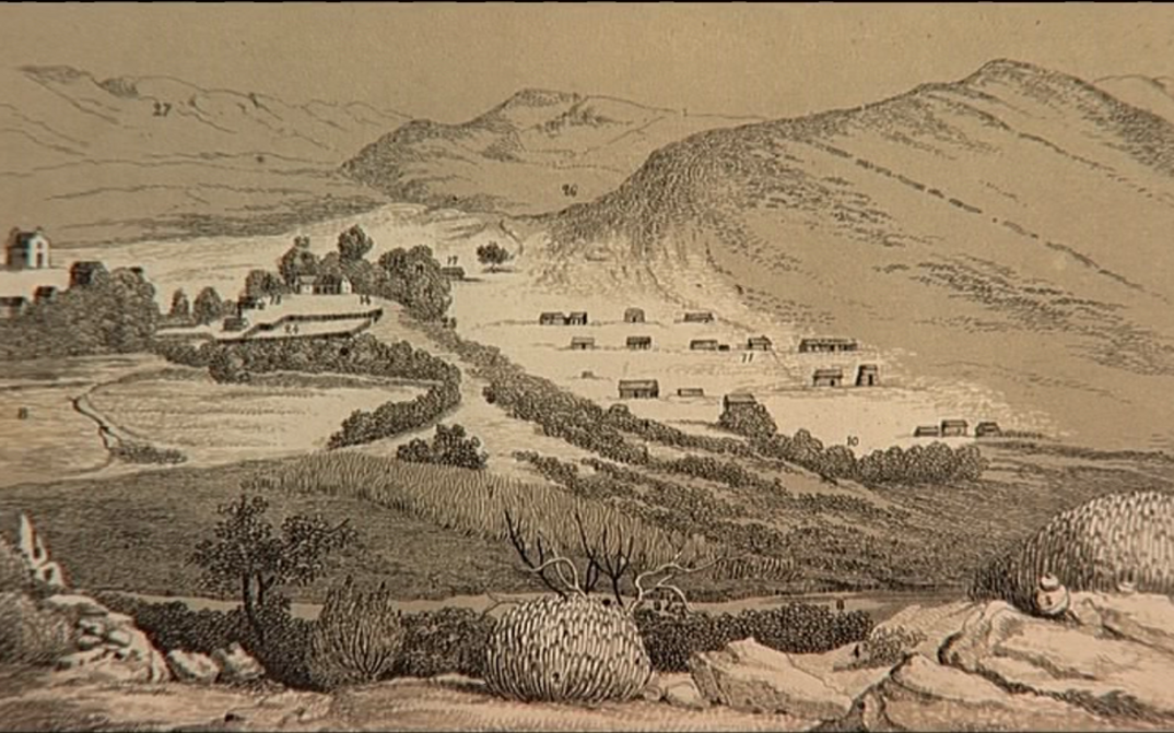 Film still from LE MALENTENDU COLONIAL: An old print of a hilly landscape with few houses.