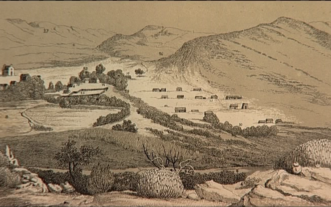 Film still from LE MALENTENDU COLONIAL: An old print of a hilly landscape with few houses.
