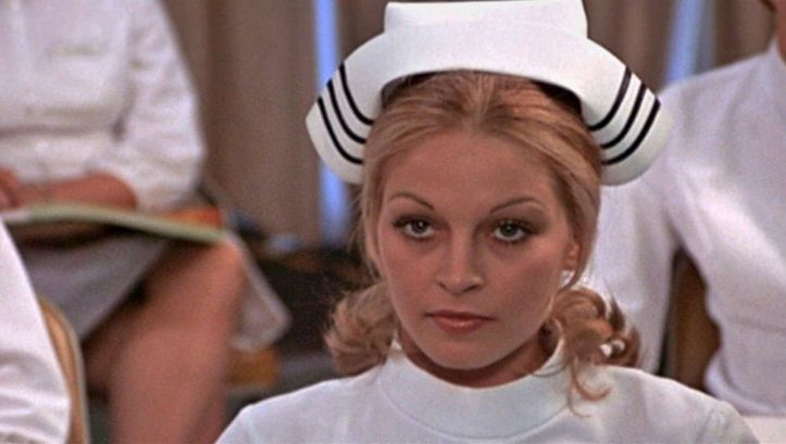 Film still from THE STUDENT NURSES: Young nurses in a classroom.