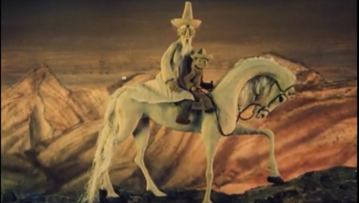 Film still from the animated film TOLUBAY: An old man and a child sit on a white horse.