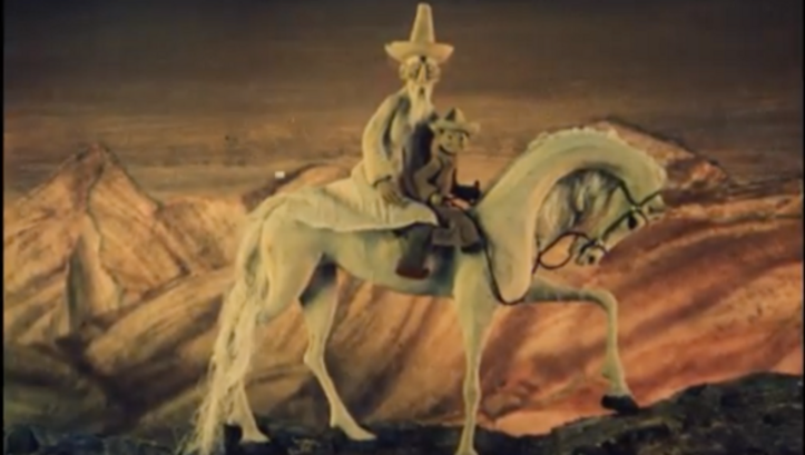 Filmstill aus dem Animationsfilm TOLUBAY: Ein alter Mann und ein Kind sitzen auf einem Schimmel.