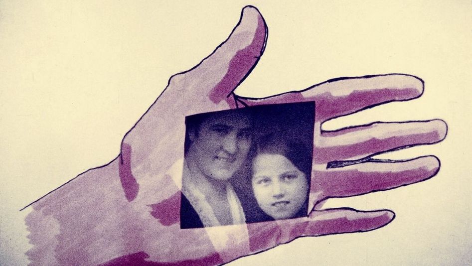 Film still from "Palmistry" by Maria Lassnig. It shows a drawn hand on which lies a photo of a man and a woman. 