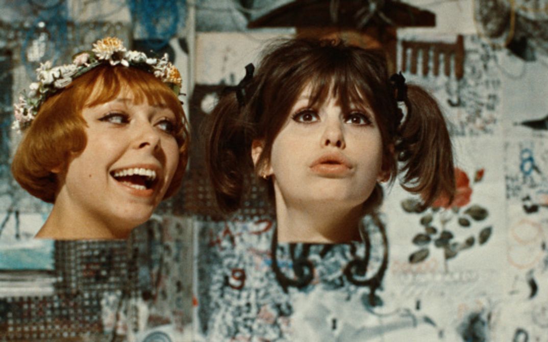 Film still from DAISIES: A collage against a colorful background with the heads of the two protagonists.