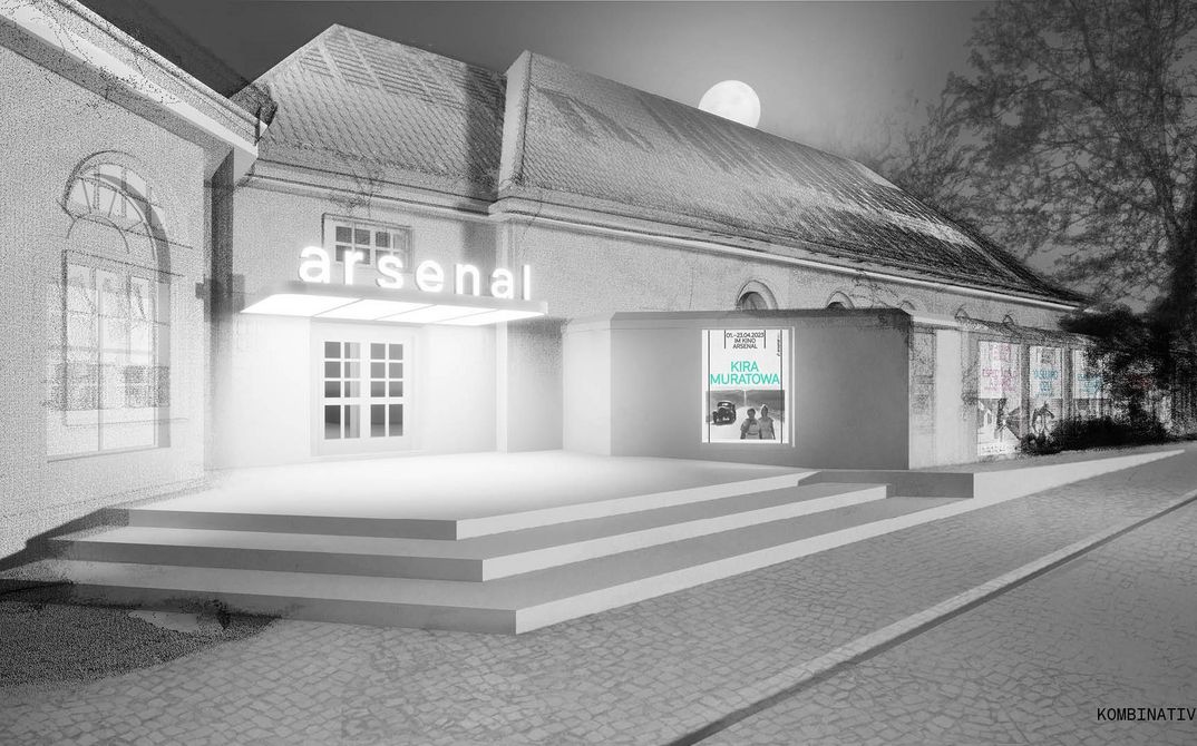 Visualization of the cinema entrance with the lettering arsenal and a program poster. 